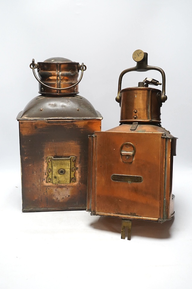 Two copper ship's bulkhead lamps, tallest 39cm. Condition - fair to good, some dents, wear etc.